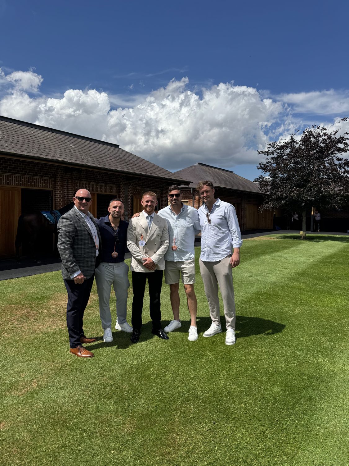 The filly's owners with the Foal to the Finish team at the stables